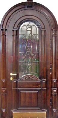 Арочная металлическая дверь массив со стеклом и ковкой ДА-50 в Солнечногорске