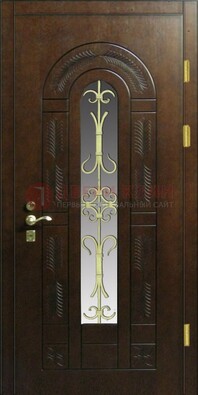 Дизайнерская металлическая дверь со стеклом и ковкой ДСК-50 в Солнечногорске