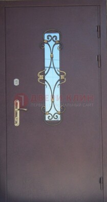 Металлическая дверь со стеклом и ковкой ДСК-77 в Солнечногорске